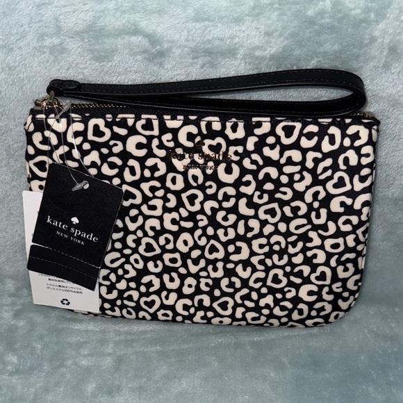 kate spade Handbags - kate spade Black and White Animal Print Wristlet